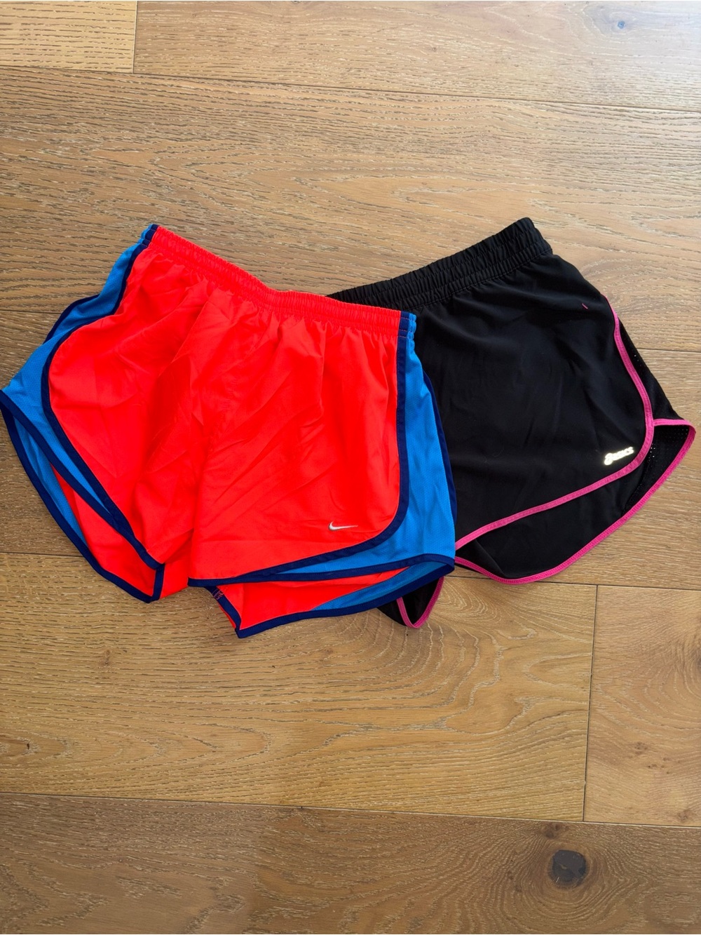 2 pair of running shorts Nike and asics size M